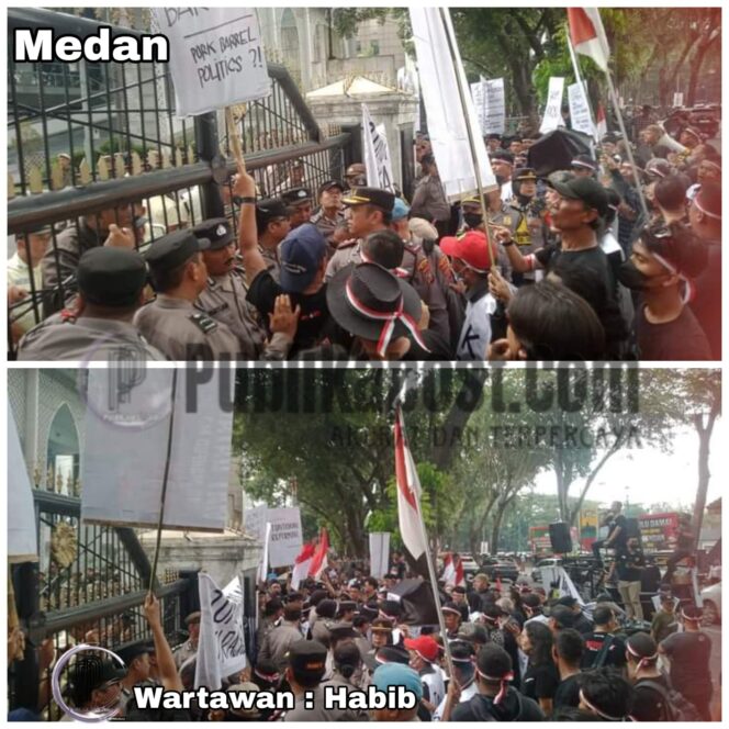 
 Ratusan Massa Melakukan Orasi Didepan Gedung Kantor DPRD Sumatera Utara Jalan Imam Bonjol, Dengan Dikawal Ketat Aparat Kepolisian